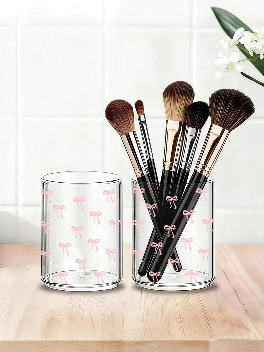 Modischer rosa Schleifen-Muster runder Acryl-Aufbewahrungsbehälter, Make-up Pinselhalter, Stift- & Kosmetikpinsel-Organizer, geeignet für Zuhause, Schule und Büro. Kompakt, multifunktional und tragbar, kann zum Aufbewahren von Wattestäbchen, Pinseln, Toilettenartikeln, Kosmetika, Schmuck und mehr verwendet werden. - Verschiedenfarbig - Übersicht 1