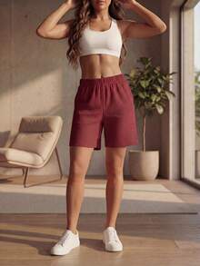 DEVIT - Short 3/4 negro para mujer estilo casual, tela rib acanalada elástica, pretina ancha sin jareta ni bolsillos, diseño básico cómodo y versátil hasta la rodilla ideal para outfits diarios, deportivos o de descanso - Vino - Ver 5