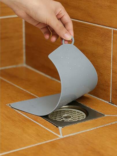 1 nắp đậy cống bằng silicon, tấm chắn khử mùi cống, 3 kích cỡ phù hợp với các loại cống nhà tắm khác nhau, có tay cầm, có thể treo để cất giữ, dễ dàng nâng hạ.
