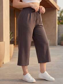 DEVIT - Pesquero de mujer con pierna de elefante, pretina con resorte y jareta ajustable, tela brush suave al tacto, diseño 3/4 casual y cómodo ideal para outfits relajados y modernos - Negro - Ver 3