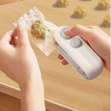 迷你可充电二合一封口机，带切割器、塑料袋热封机、食品保鲜机、小型电动真空封口机、USB充电式食品储存封口机