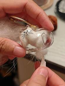 1个透明宠物毛发收纳吊坠钥匙扣袋，可爱猫咪造型纪念容器，猫毛收集胶囊，密封宠物毛发收纳盒，适合DIY纪念吊坠，送给爱猫人士和宠物哀悼者的礼物，可用作礼品、汽车配件、包包挂件、可爱猫咪钥匙扣、猫咪饰品 - 彩色 - 查看 10