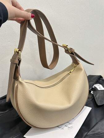 1个女士真皮饺子造型PU皮单肩马鞍包，纯色，可调节肩带，适合日常通勤