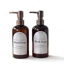 2个500毫升可重复灌装的洗发水、沐浴露、洗手液、润肤露瓶，带按压泵