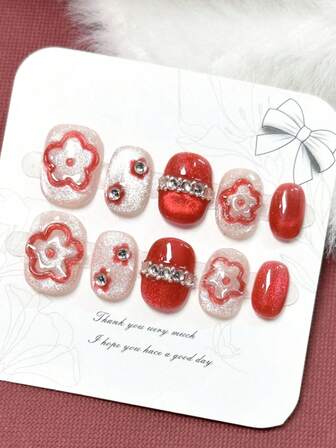 A Set Of 10 Short Square Exquisite Wearable Nails Featuring Y2K Hand-Painted Red And White Cat-Eye Glitter With Multiple Small Red Flowers And Diamonds, Exuding A Minimalist Style. These Nail Decorations Make Fingers Appear Longer And Add A Touch Of Fashion To Your Nails.