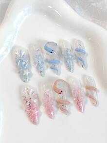 情人节特惠。一套10片长杏仁形手工精致美甲贴片，采用Y2K风格手绘蓝粉渐变色，饰以闪亮细闪粉、烟花、星星和立体树脂花朵。 - 彩色 - 查看 11