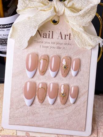 10 piezas de uñas postizas con forma de almendra hechas a mano con diseño de francés blanco y estallido de estrellas. Presenta un contorno de círculo dorado hecho a mano en 3D, combinado con un estilo francés blanco pintado a mano con estallidos de estrellas doradas. Estas elegantes, románticas y minimalistas uñas postizas exudan un ambiente sofisticado, sexy y lujoso. Perfectas para uso diario, citas, conciertos y ocasiones laborales ligeras, son un excelente regalo para mujeres y niñas.
