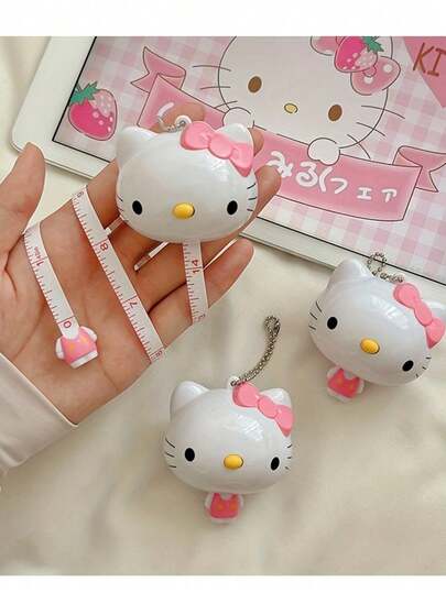 1개 헬로 키티 카툰 귀여운 플러시 수축 테이프 측정기, 소프트 자, 자동 수축 자, 의류 측정 테이프, 미니 키체인 (40cm까지 확장 가능), 코를 눌러 수축, 휴대용 소프트 측정 테이프 - 사랑스러운 카툰 미니 자, 핑크 리본 디자인, 허리, 가슴 및 가정용으로 적합, 미니 자, 무료 배송