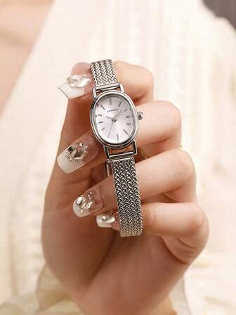 LIANDU LIANDU This Oval-Shaped Vintage-Style Quartz Women's Watch Is Fashionable And Elegant. The Dial Is Decorated With Rivets, And The Strap Is Adjustable. It Is Exquisite And Compact, Suitable For Daily Wear, Birthday Gifts, Parties, Holiday Gatherings, And An Ideal Choice For Yourself Or Friends.