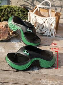 1双女士EVA材质凉鞋，字母人字带，黑绿撞色设计，舒适厚底坡跟，适合日常休闲穿着及室内/室外场合。 - 黑色 - 查看 6