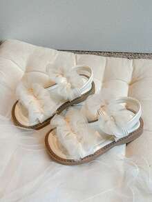 1双粉色薄纱蝴蝶结儿童平底凉鞋，防滑耐穿，低帮系带设计，梦幻公主风，适合幼儿园周末郊游。 - 白色 - 查看 7