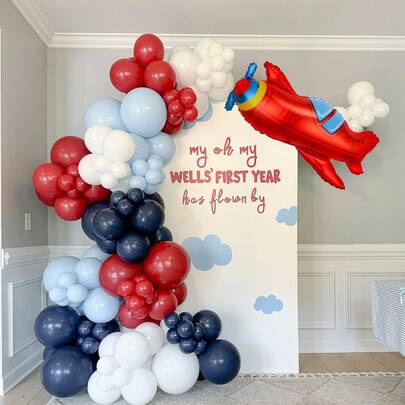 134件套飞机气球拱门套装，包含红白蓝乳胶气球和大型飞机铝膜气球，非常适合生日派对装饰、迎婴派对装饰、飞行主题派对装饰。