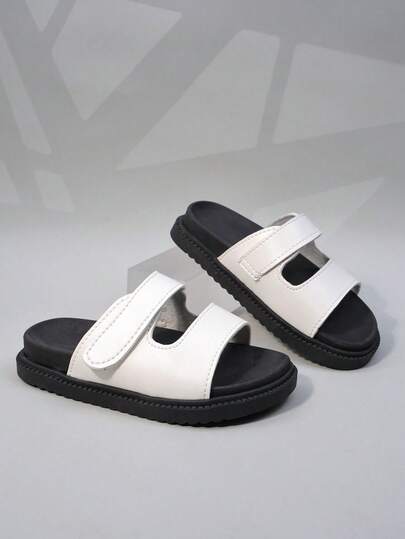 1 Pair Girls' Black & White Contrast Color Thick Sole Slide Sandals. Faux Leather Upper, Simple Double Strap Design, Open Toe Low-Top Style. Thick Sole Comfortable Casual, Suitable For Daily Indoor And Outdoor Walking.