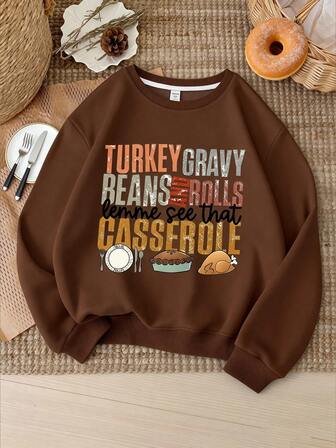 这款休闲宽松卫衣适合青少年女孩穿着，印有字母和食物图案，圆领长袖设计；非常适合秋季、开学季和日常穿着。童装女童