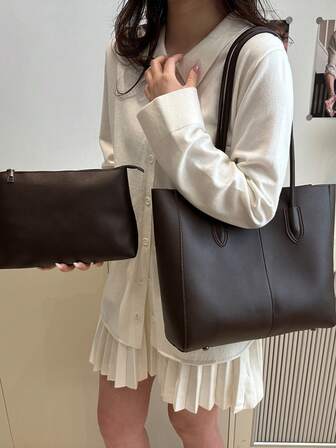 大容量单肩手提包，适合上学和通勤。