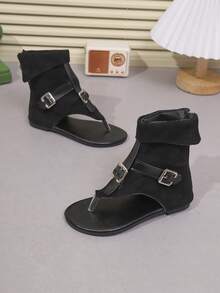Đôi sandal mùa hè thời trang dành cho bé gái này có thiết kế cổ cao, khóa kéo ở gót và quai hở ngón, mang đến vẻ ngoài sành điệu và thanh lịch, là sự lựa chọn hoàn hảo cho các bé gái tham dự các bữa tiệc. - màu đen - Xem 6