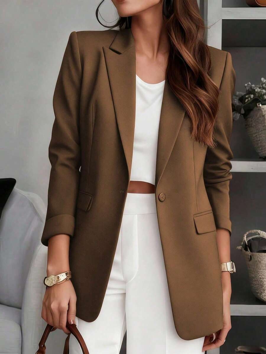 Áo blazer nữ màu trơn cổ bẻ, thiết kế túi trước cài cúc, tay dài, phù hợp mặc công sở và thường ngày, thích hợp cho mùa thu, đông và xuân. - Cà phê nâu - Xem 1