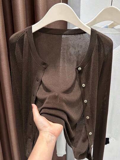 新款优雅休闲针织开衫，纯色圆领长袖单扣透视设计，时尚简约通勤精致薄款针织开衫，防晒薄款宽松针织开衫，适合外出度假穿着，女士街头时尚