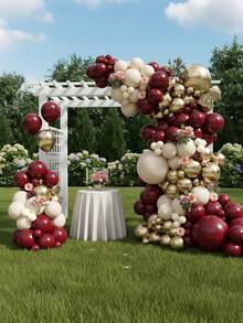 158件套酒红色气球拱门套装，包含各种尺寸的金色金属气球和酒红色珍珠乳胶气球，适用于毕业典礼、结婚纪念日、生日派对、迎婴派对、情人节派对装饰。 - 彩色 - 查看 9