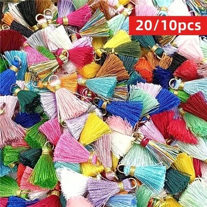 Yiwu Qiyou Accessories Co., LTD 20 قطعة/10 قطع شرائط تزيين بتصميم خيوط متنوعة الألوان من البوليستر بطول 23 مم، ملحقات خياطة الستائر، DIY سلاسل المفاتيح وأشرطة الهواتف المحمولة والقلادات والتعليقات للمجوهرات للنساء