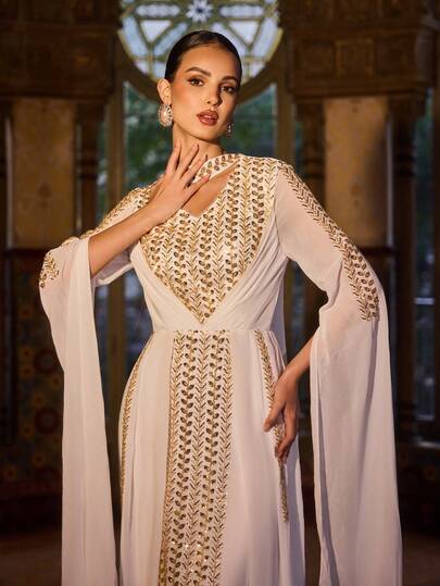 Faeriesty Áo Abaya Ả Rập thanh lịch cổ chữ V sâu, đính cườm và tay áo xẻ tà, thích hợp cho các buổi dạ hội, đám cưới, lễ hội, tiệc chiêu đãi và những dịp đặc biệt.