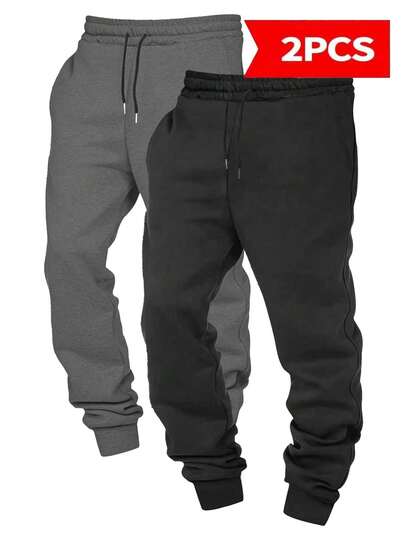 男士两件套束腰纯色印花长款运动裤，两件套基础款健身慢跑裤，100%涤纶面料，穿着舒适，适合情侣穿着，居家户外皆宜，配有抽绳腰带，多种颜色可选。