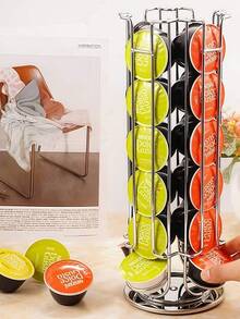 Ein drehbarer, rutschfester Ständer zur Aufbewahrung von Kaffeekapseln und Zubehör. Dieser praktische Kapselorganizer im Turmdesign ist um 360 Grad drehbar und bietet Platz für bis zu 24 Kapseln. Eine stilvolle Aufbewahrungslösung. - Silber - Übersicht 2