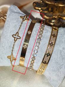 1/4件套奢华不锈钢四叶草和六芒星扣手链，搭配优雅立方氧化锆四叶草铜手链和合金圆钻手链，适合女士日常佩戴，亦可作为节日礼物。 - 金色 - 查看 4