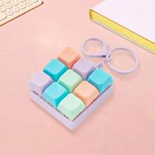 1 pieza Nuevo Cubierta de teclado para alivio del estrés con llavero - Un juguete para los dedos con efecto de sonido, anillo de metal y cadena, juguete de presión para adultos, accesorio de escritorio divertido, alivia eficazmente el estrés y presenta colores macaron brillantes. La apariencia, el color y el diseño son muy atractivos, lo que lo convierte en un regalo perfecto para fiestas, regalos y obsequios para amigos. - Multicolor - Ver 9