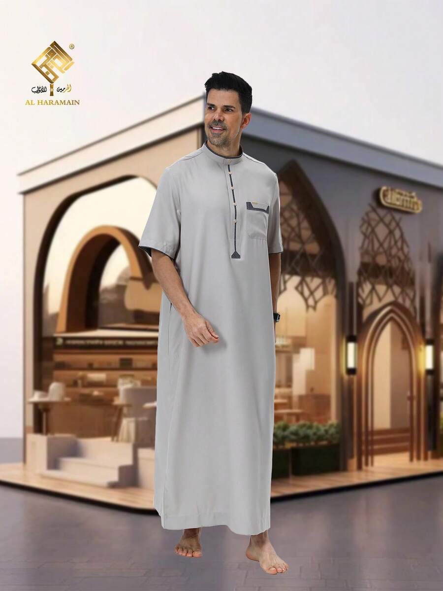 AL HARAMAIN Áo Thoub nam HARAMAIN thiết kế 4 nút, cổ đứng, tay ngắn thời trang, áo choàng nam Ả Rập bán chạy nhất, áo choàng nam Ả Rập thanh lịch - Áo choàng cầu nguyện tay dài mềm mại, có thể giặt máy, phù hợp cho mọi mùa và các dịp lễ tôn giáo, thiết kế cổ tròn, chất liệu mịn màng. - Màu Xám nhạt - Xem 1