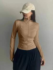 Blusa para academia manga longa lisa confortável elegante basica modinha com ziper frontal com gola alta modela a cintura casaco de academia com gola manga longa promoção blusinha branca de academia colada cintura manga longa 2026 - Bege - Visão 1