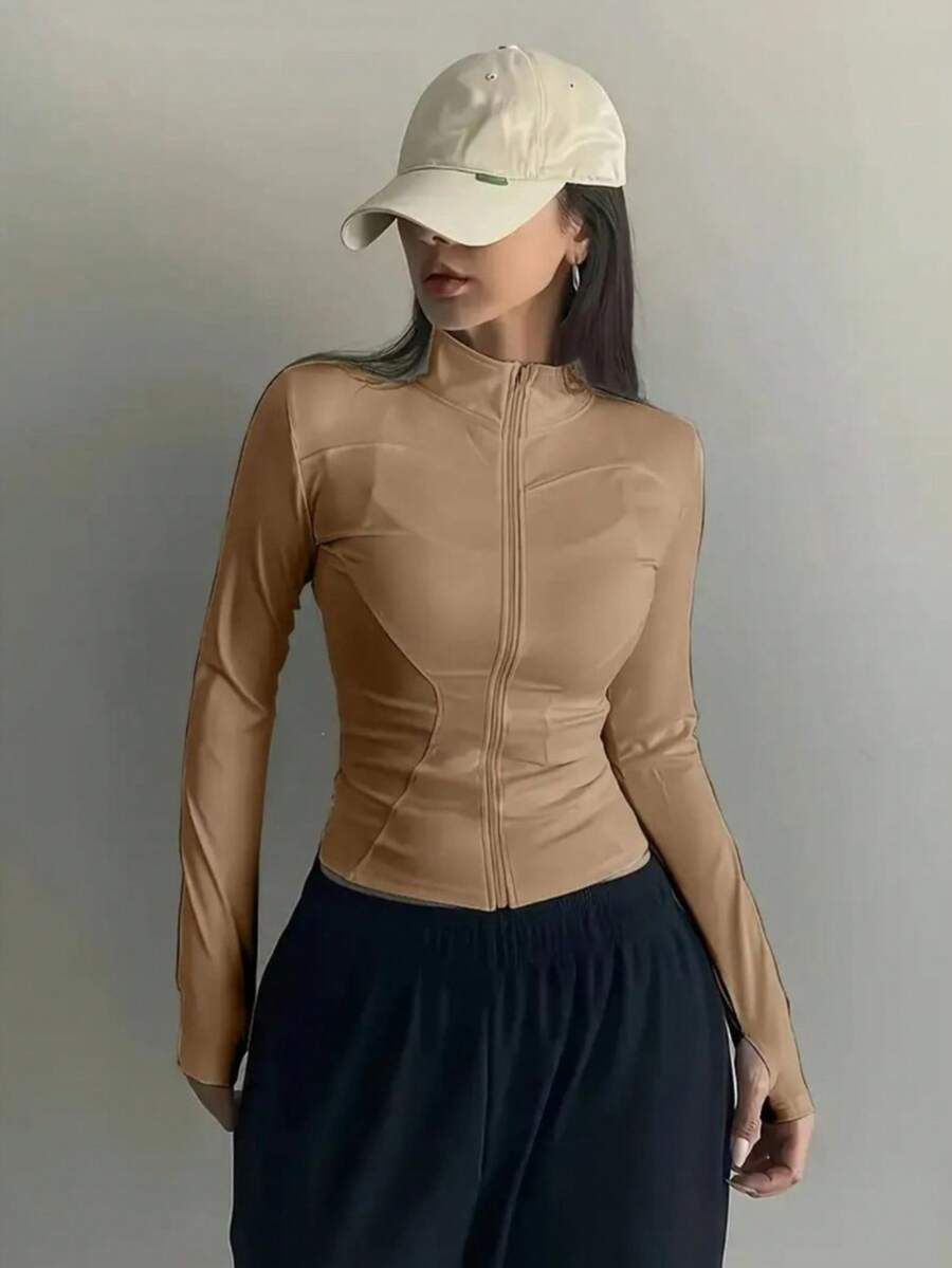 Blusa para academia manga longa lisa confortável elegante basica modinha com ziper frontal com gola alta modela a cintura casaco de academia com gola manga longa promoção blusinha branca de academia colada cintura manga longa 2026 - Bege - Visão 1