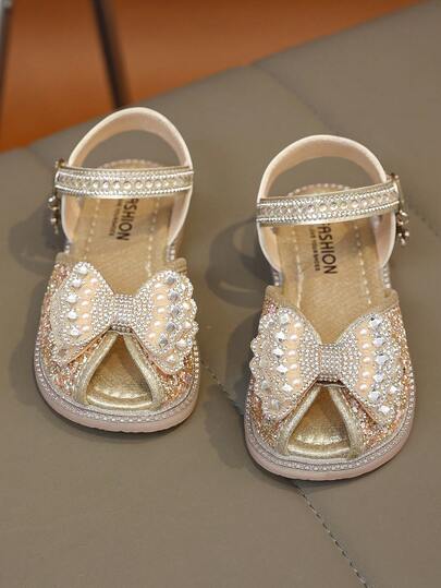 1 Đôi dép xăng đan kiểu mới cho bé gái, có nơ trang trí, dép xăng đan đế bằng thời trang, thanh lịch, chống trượt, bền, thoải mái, nhẹ, phù hợp cho tiệc tùng, đi chơi, dạo phố, giày dép cho bé gái