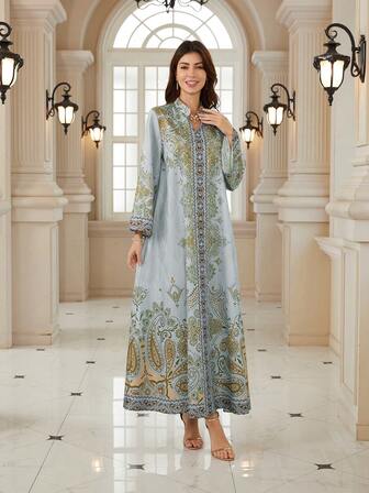 Elegante vestido de manga larga con cuello en pico para mujer, hecho de tela tejida con un vibrante estampado bohemio, que muestra un estilo elegante