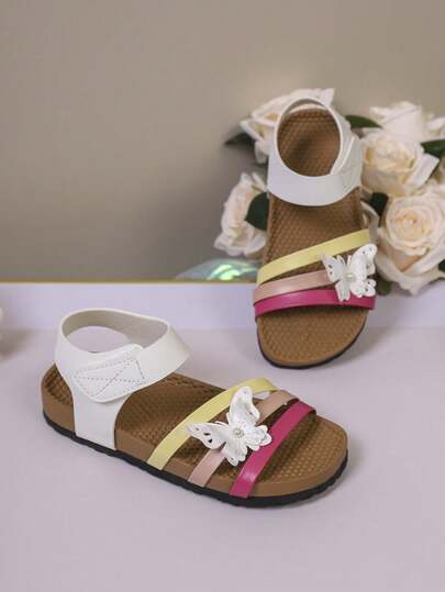 2026 Nuevas sandalias de niña con diseño de mariposa, transpirables y anti-humedad, de puntera abierta y colores llamativos, para niños pequeños y grandes