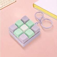 1 pieza Nuevo Cubierta de teclado para alivio del estrés con llavero - Un juguete para los dedos con efecto de sonido, anillo de metal y cadena, juguete de presión para adultos, accesorio de escritorio divertido, alivia eficazmente el estrés y presenta colores macaron brillantes. La apariencia, el color y el diseño son muy atractivos, lo que lo convierte en un regalo perfecto para fiestas, regalos y obsequios para amigos. - Multicolor - Ver 11