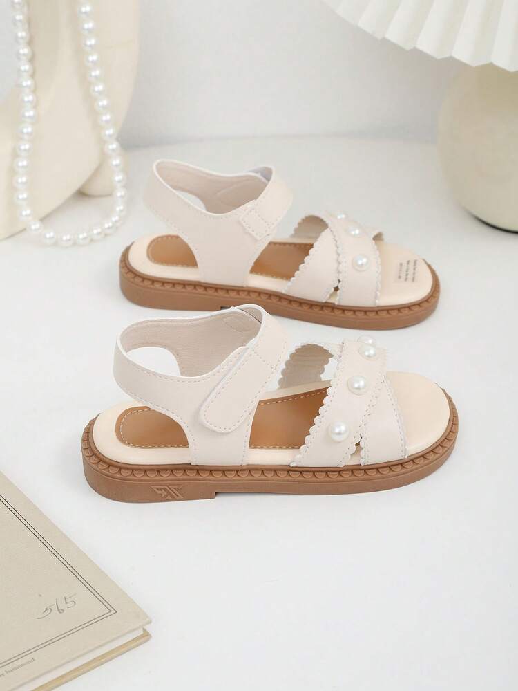 1 par beige platta sandaler för småbarn/små flickor, mjukt läder, vågiga detaljer, korsade pärlor, kardborreband, rund tå, halkfri mjuk sula, moderiktig prinsessstil, lämplig för 3-15 år gamla flickor, vardag, strand, campus, vår/sommar 2026 - Beige - Visa 6