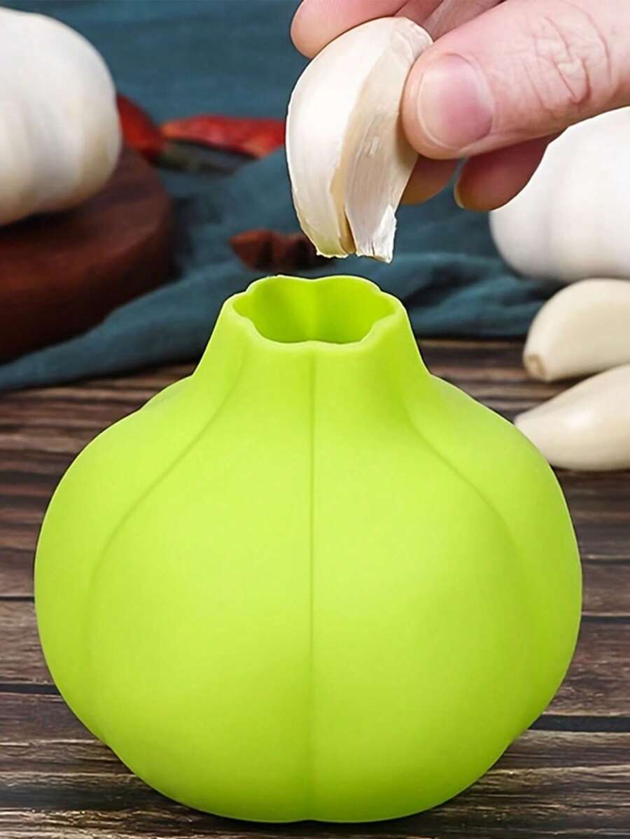 1个硅胶蒜瓣剥皮器，适用于厨房蒜瓣剥皮。它能快速去除蒜瓣角质，而且易于清洗。 - 彩色 - 查看 1