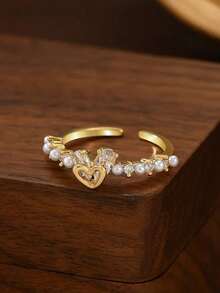 Bộ 5 chiếc nhẫn điều chỉnh được, thanh lịch, tinh tế, đính ngọc trai giả và đá Cubic Zirconia hình trái tim và nơ, thiết kế độc đáo, thích hợp đeo hàng ngày, dự tiệc, họp mặt (Không kèm hộp quà). - Vàng - Xem 5