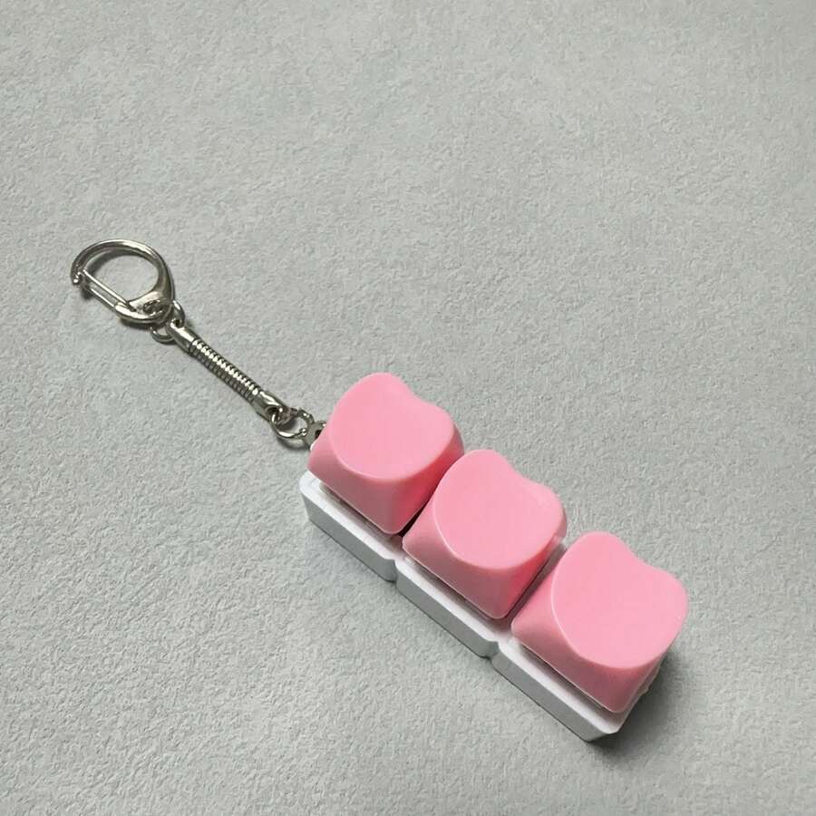 1个心形开关测试器钥匙扣 - 带键盘按钮的按压式指尖玩具，情人节减压感官钥匙扣 - 彩色 - 查看 1