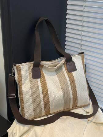 时尚新款条纹大容量单肩包，女士适用，适合购物、工作、休闲等场合。