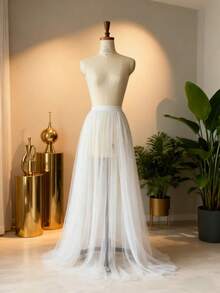 一件装女士黑色可拆卸裙摆 - 轻盈的白色裙摆延伸部分，带有拖尾。可选双层或四层网纱薄纱款式，采用半包裹式围裙设计，中间略微开口。 - 彩色 - 查看 6