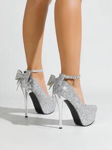5.5英寸（14厘米）高跟女式时尚浅口鞋，厚底设计，闪亮银色材质，柔软舒适，蝴蝶结细高跟，优雅奢华，性感高跟鞋，单带设计，穿着稳固，适合婚礼、T台走秀、女士晚宴、约会、派对和夜店等场合。