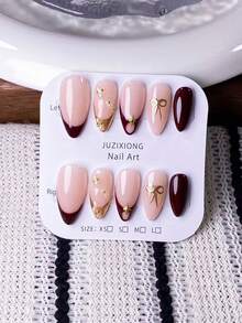 10 قطعة من طلاء الأظافر الأحمر بشكل اللوز مصنوع يدويًا، تصميم فرنسي مدبب، حافة فرنسية معدنية، زخرفة من الخرز الفولاذي واللؤلؤ، فيونكة نجمية ذهبية، أظافر حمراء، بسيطة وأنيقة، جودة عالية المستوى. مناسبة لأي مناسبة. تصميم للتركيب، سهل وسريع التطبيق والإزالة.