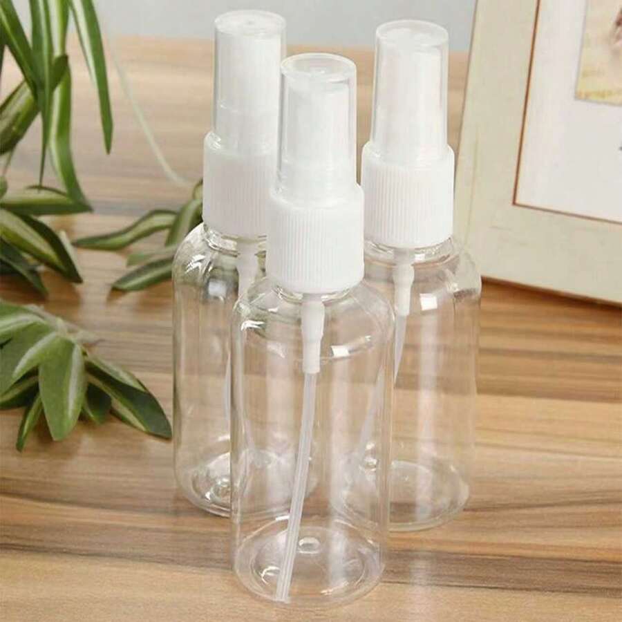 4pcs 30ml Refillable Spray Bottles, Portable Reusable Fine Mist Sprayer Bottles, Travel Size Cosmetic Sample Spray Containers - Clear - View 1