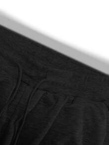 Quần jogger nam dáng rộng phong cách đường phố - Chất liệu mềm mại, quần thể thao thường ngày với dây rút ở eo, túi bên tiện dụng, quần thoải mái cho mặc hàng ngày, phong cách sống thành thị và thời gian thư giãn. - màu đen - Xem 4