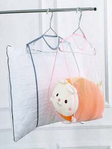 多功能晾衣网，可用于晾晒枕头和玩具，保护衣物，节省空间，并有助于收纳整理。