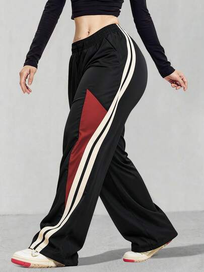 Modne, patchworkowe spodnie damskie maxi, luźna długość maxi, kontrastowy patchworkowy akcent, podnoszący poziom stroju, odpowiednie do codziennego noszenia w drodze do pracy i na co dzień.