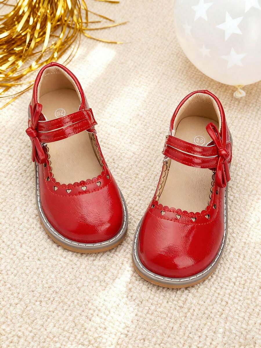 A Pair Of Red Shoes With Bow - Leather Shoes,Oxford Shoes,Loafer Shoes,Flat Shoes Kids Shoes,Shoes,Girls Shoes,Girl Shoes,Zapatos De Niña,Toddler Girl Shoes,Kid Shoes,Zapatos Para Niñas,Shoes For Girls,Zapatos De Niño,Zapatos,Zapatos Para Niña,Kids,Shoes Kids,Zapatos De Niñas,Zapatos Para Niños,Little Girl Shoes,Zapatos Niña,Zapatos De Niños,Girls Dress Shoes,Girls,Flats,Zapatos Niñas,Toddler Girl,Shoes Girls,Loafers For Toddler & Little Girls & Little Boys | Ideal For School Day,Field Trip,After-School Playdate,Birthday Party,Family Brunch,Picnic,Church Service,Holiday Gathering,Art Class,Library Visit,Park Stroll,Weddings,Outings,Special Occasions,Christmas,New Year Celebrations - 5323 Đỏ - Xem 1