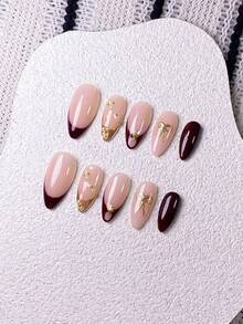 10 قطعة من طلاء الأظافر الأحمر بشكل اللوز مصنوع يدويًا، تصميم فرنسي مدبب، حافة فرنسية معدنية، زخرفة من الخرز الفولاذي واللؤلؤ، فيونكة نجمية ذهبية، أظافر حمراء، بسيطة وأنيقة، جودة عالية المستوى. مناسبة لأي مناسبة. تصميم للتركيب، سهل وسريع التطبيق والإزالة.